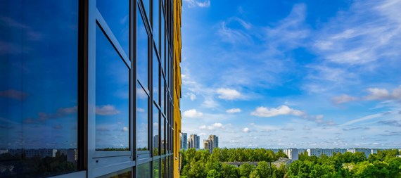 Top view of city and green trees_Medium.jpeg